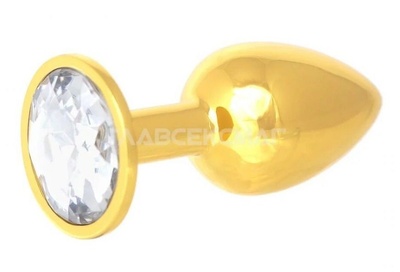 Золотистая анальная пробка с прозрачным кристаллом - 7 см. Главсексмаг (прозрачный) 