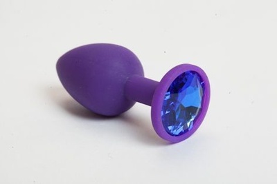Фиолетовая анальная пробка с синим кристаллом - 7 см. Главсексмаг (синий) 