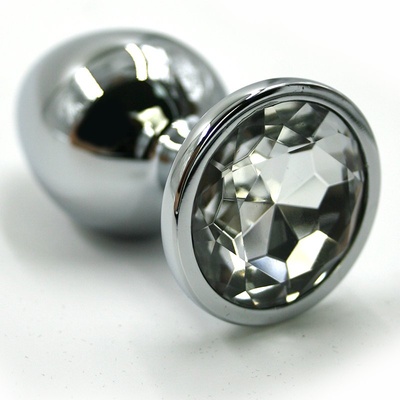 Маленькая алюминиевая анальная пробка Kanikule Small с кристаллом – серебристый с прозрачным Beauty Brands Limited (Прозрачный) 